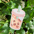 Bubble tea sticker with cute boba ducks inside. Art by Qinmo.