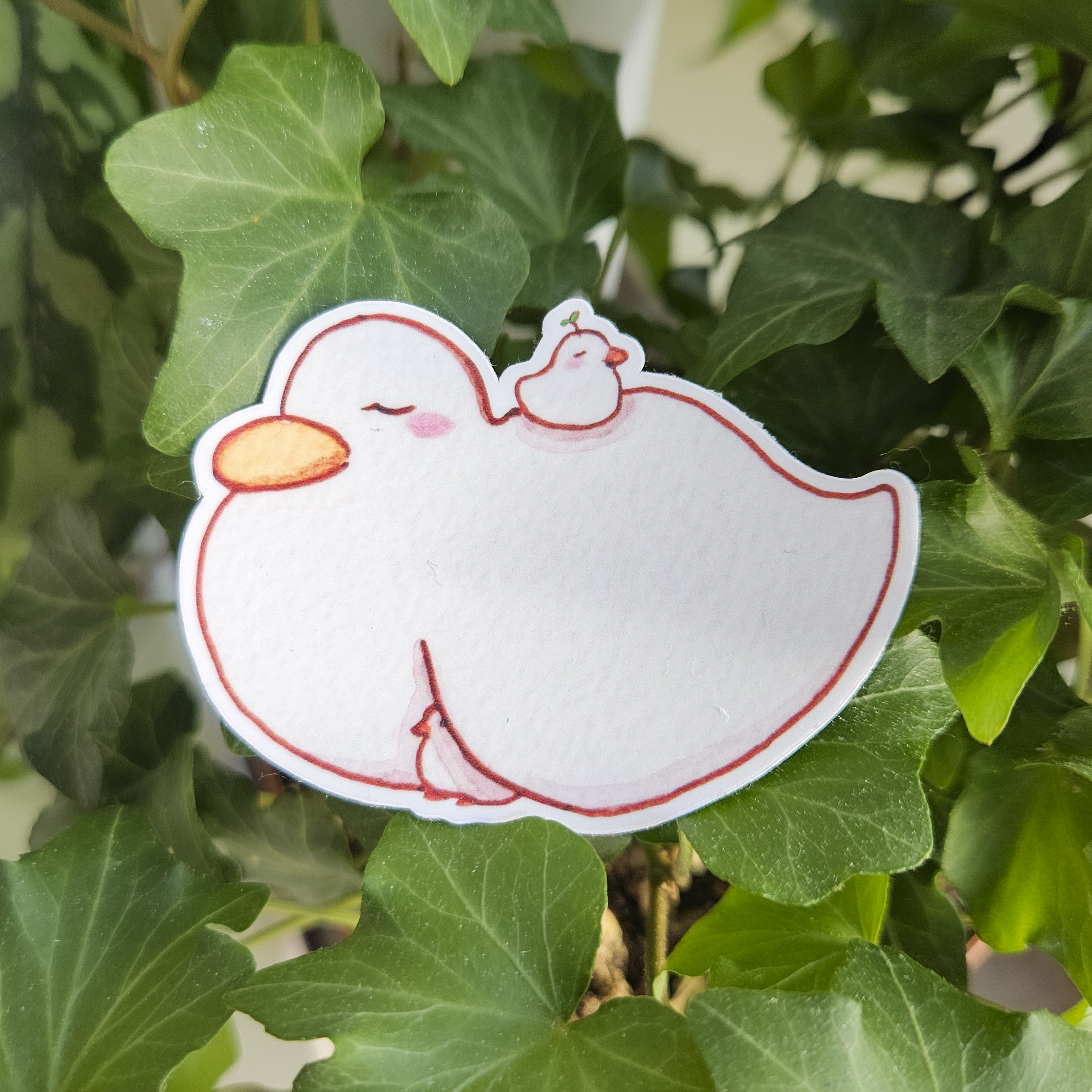cute duck with duck baby in its wing and on top sticker
