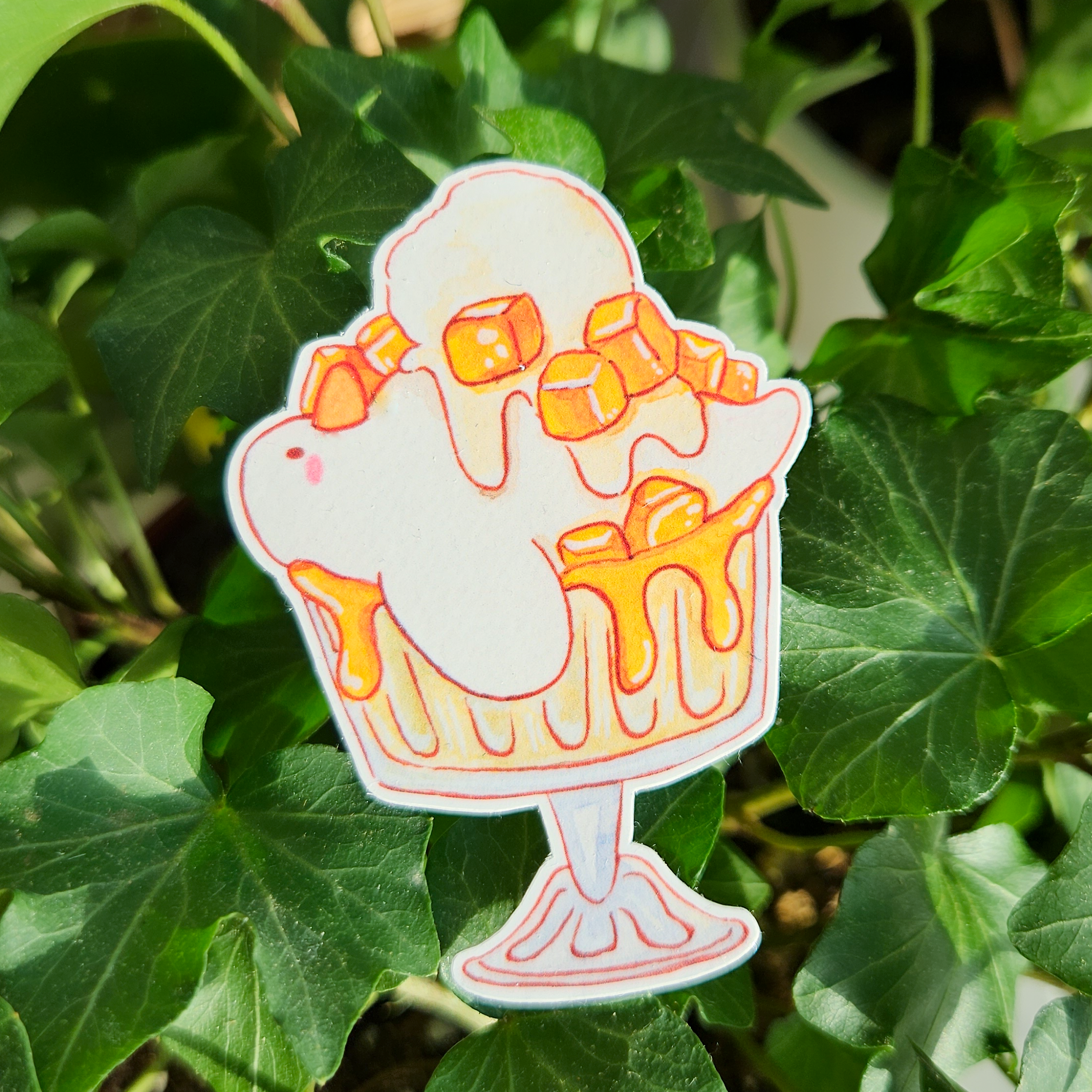 a cute duck with mango bits and ice cream in a cup sticker. 