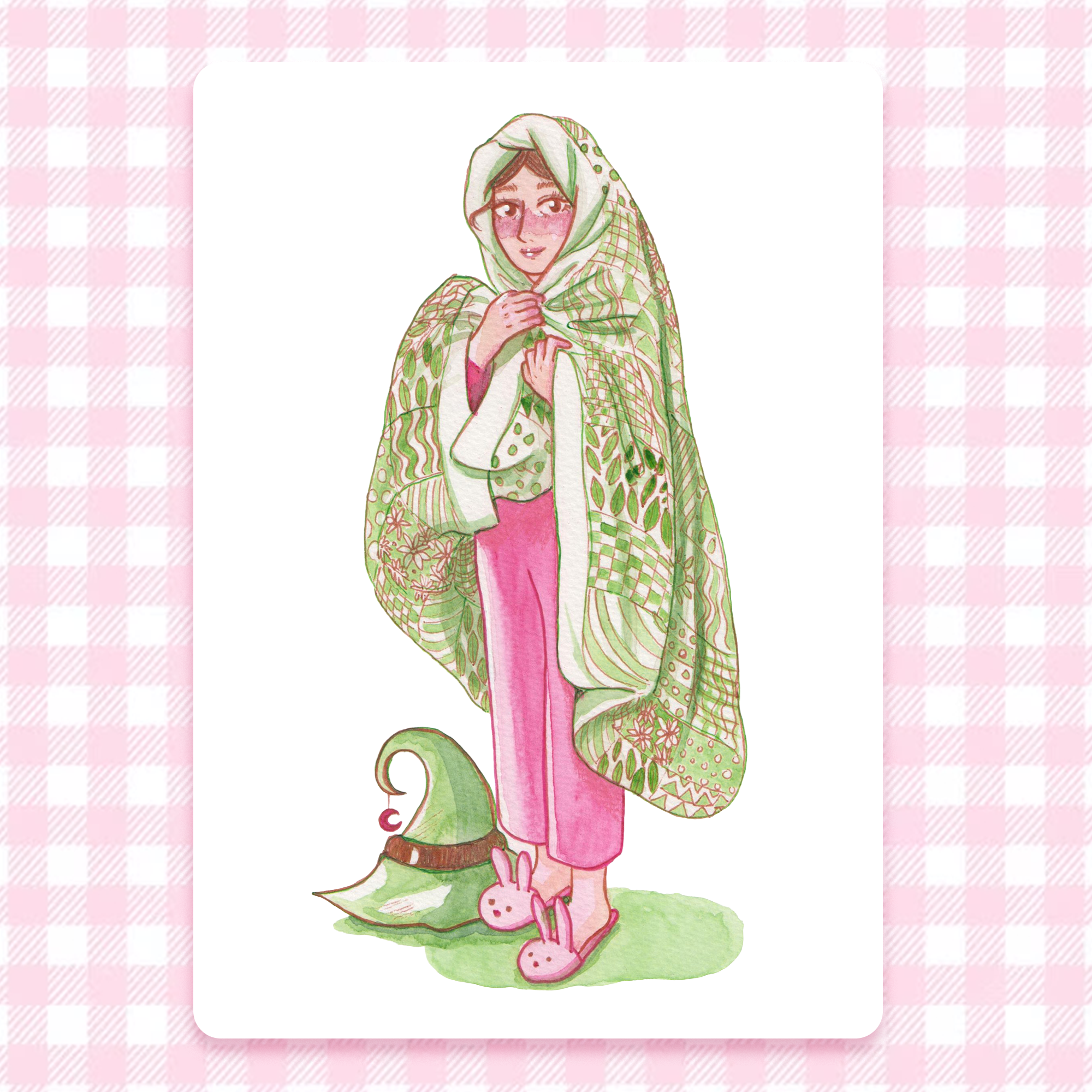 Illustration of a witch wearing a green patterned quilt, with the witch hat on the floor. Print
