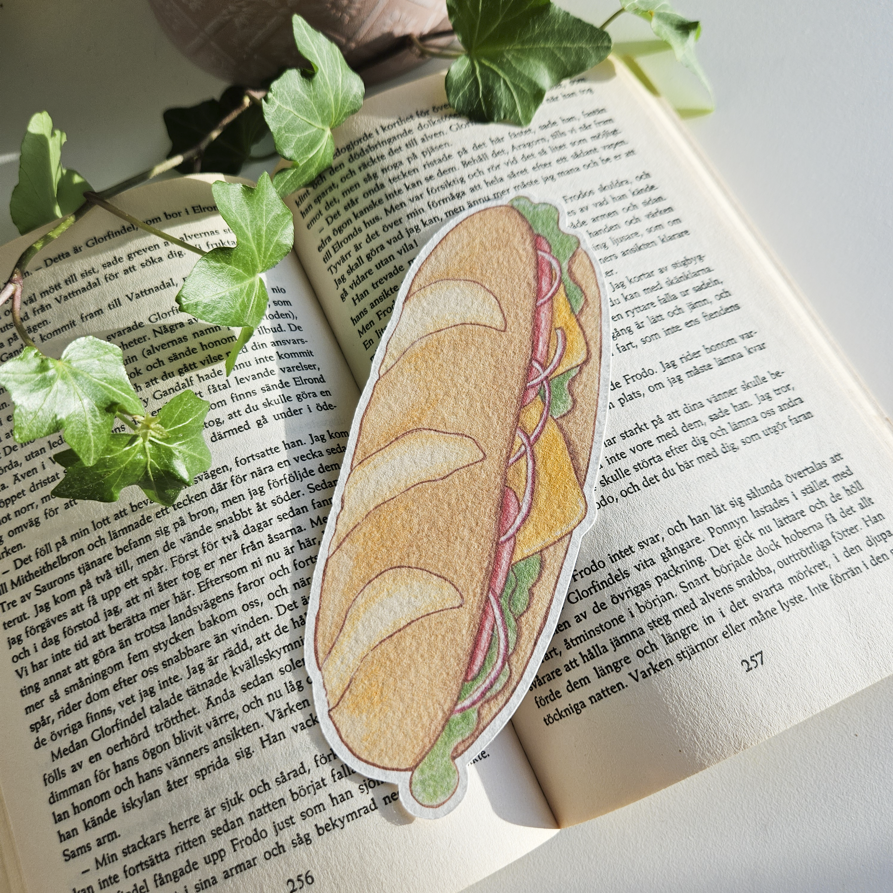 Sandwich-shaped bookmark. Baguette.